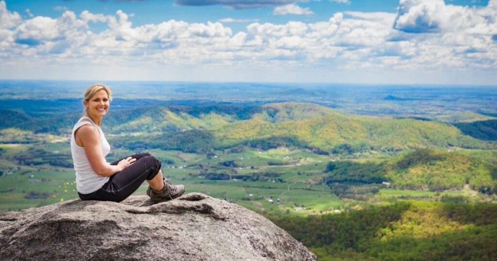 Girl relaxing on the Old Rag Mountain trail in Shenandoah Valley National Park, Virginia