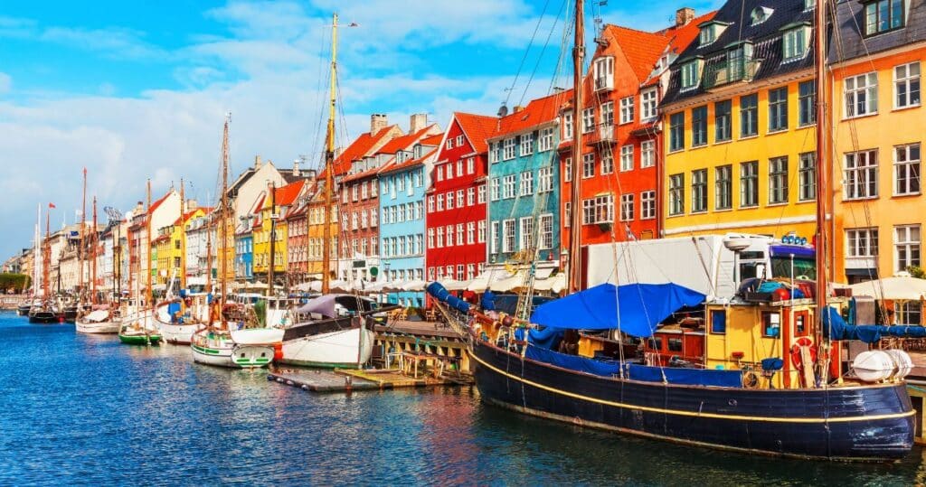 a canal in copenhagen filled with boats