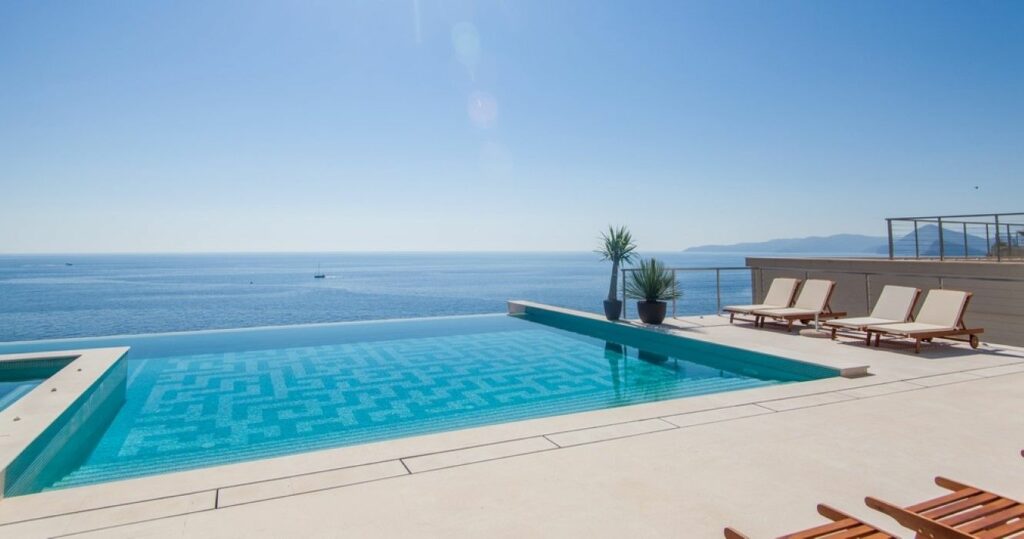 Swimming pool at a resort with beach view