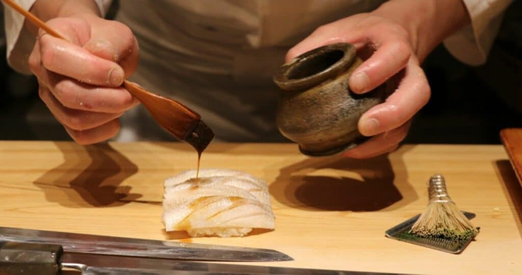 Japanese Chef Making Sushi in Tokyo, Japan