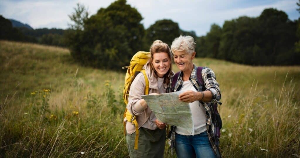 Mother and daughter hiking together