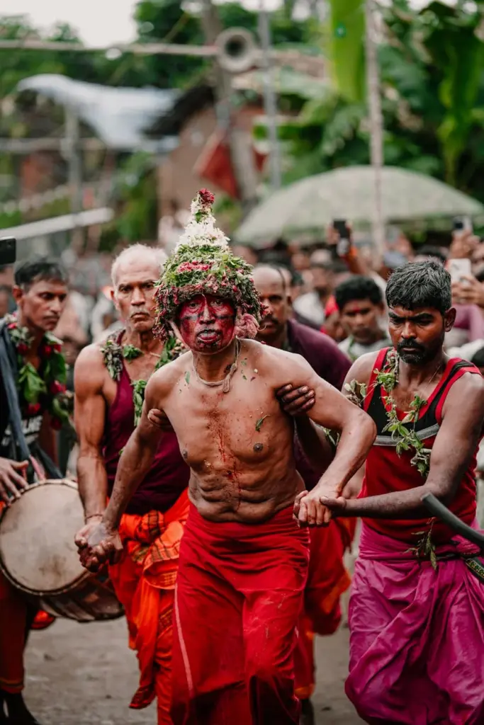 Vibrant cultural procession during Kolabira festival in Odisha, India, showcasing traditional rituals and attire.