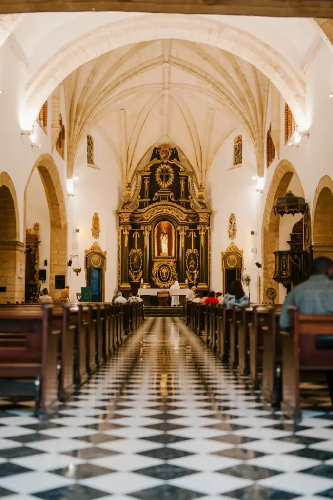 A serene view of the ornate interior of a historic cathedral in the Dominican Republic.