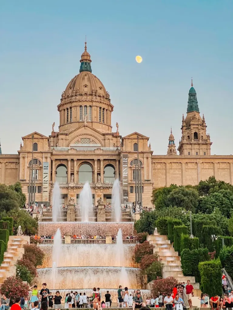 Scenic view of Palau Nacional and its fountain in Barcelona at day.