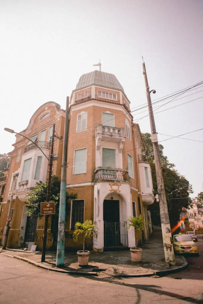 Charming corner lot building with classic architecture in Rio de Janeiro, Brazil.