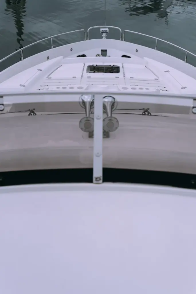 View from the bow of a luxury yacht on calm waters, perfect for travel enthusiasts.