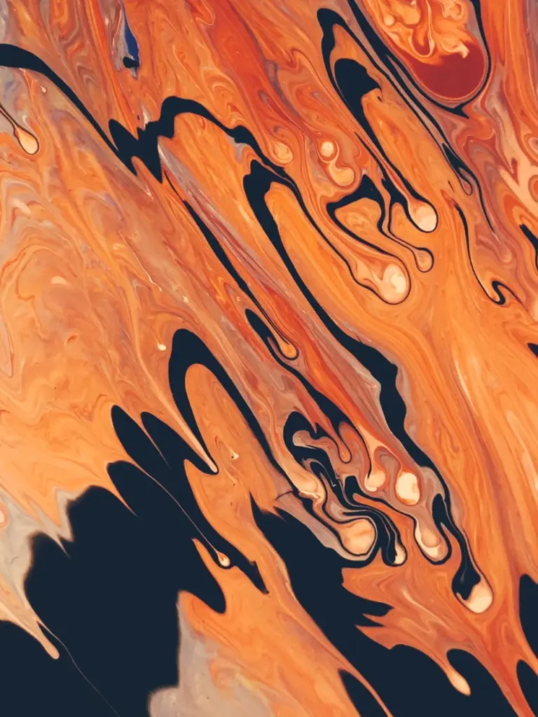 Dynamic abstract art piece featuring vibrant acrylic paint drips in fiery hues.
