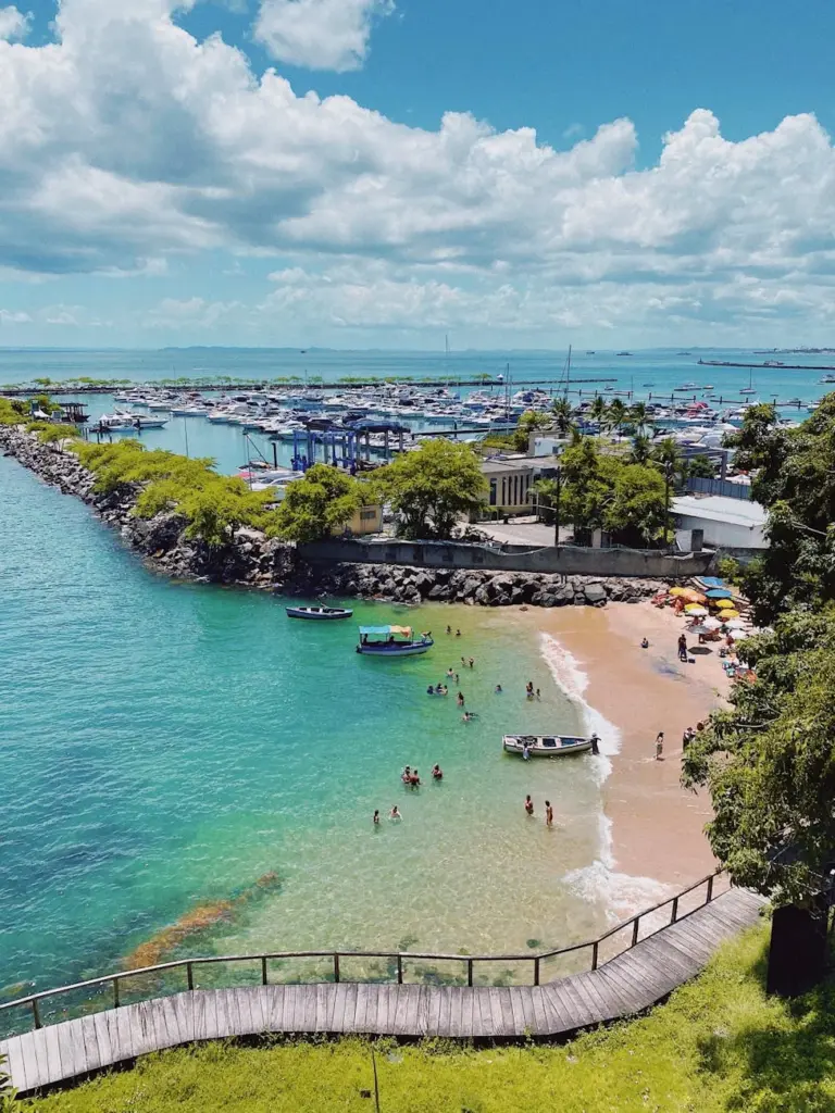 A picturesque aerial view of a beach and marina in Salvador, Brazil.