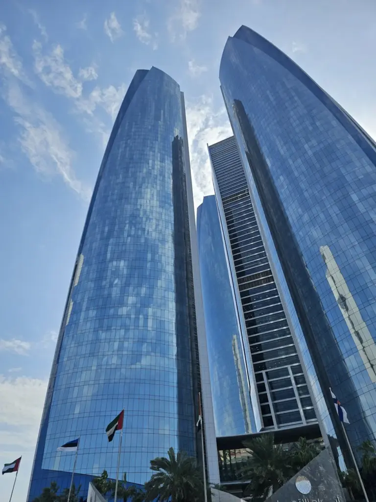 A stunning view of the iconic Etihad Towers reaching toward the sky in Abu Dhabi.