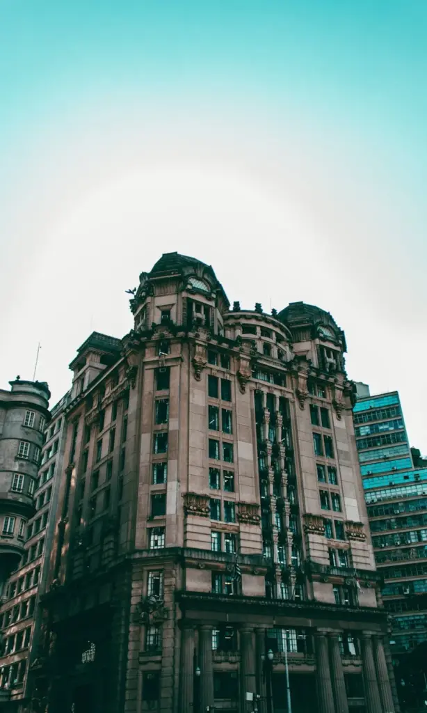 Vertical shot of a historic building in São Paulo's urban landscape captured during the day.