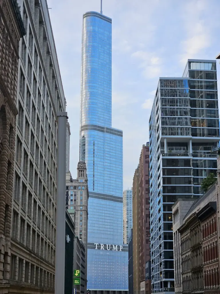 A view of Chicago's Trump Tower amidst historic and modern architecture in downtown.