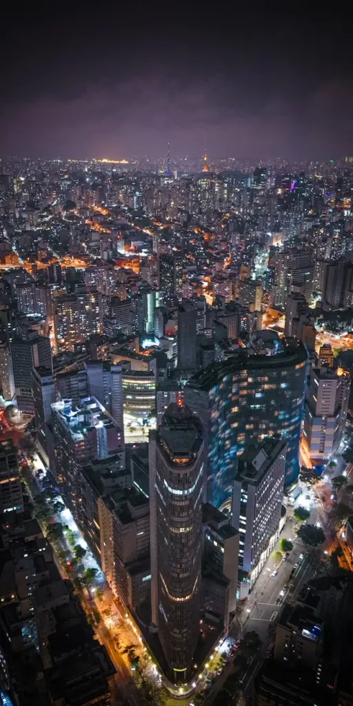 Stunning aerial view of São Paulo, Brazil showcasing vibrant city lights at night.