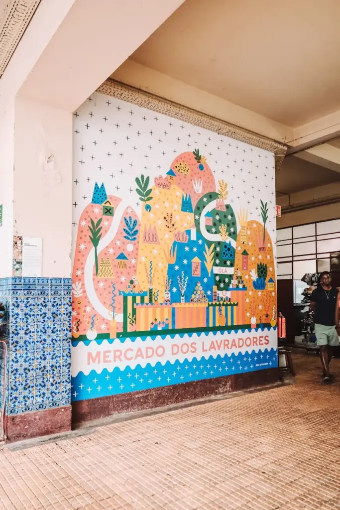 Vibrant mural art at Mercado dos Lavradores in Funchal, Madeira, capturing colorful abstract designs.
