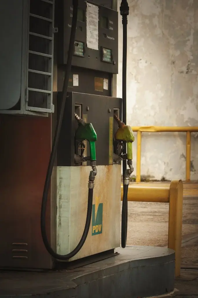 Old and shabby gasoline pump at an abandoned gas station in Venezuela.