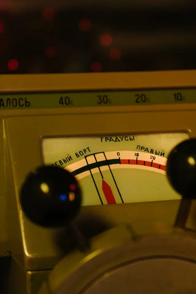 Close-up view of a vintage dashboard with a detailed gauge display, capturing an era of classic design.