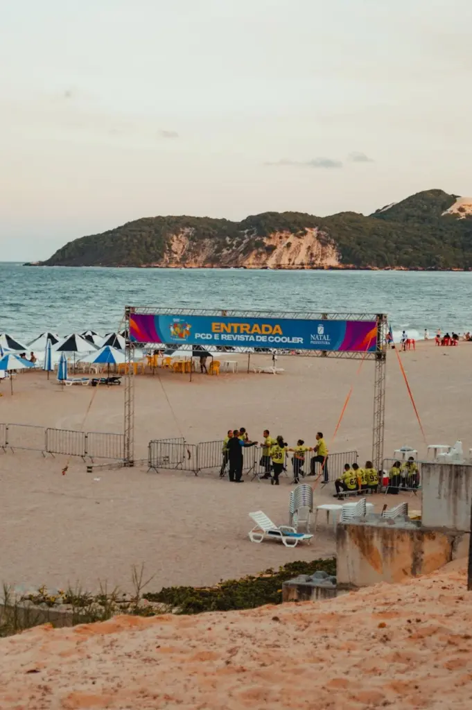 Entrance to event on Ponta Negra Beach, Natal, Brazil with scenic ocean view.
