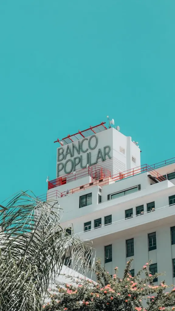A stunning view of a modern building featuring the Banco Popular sign in San Juan, Puerto Rico.