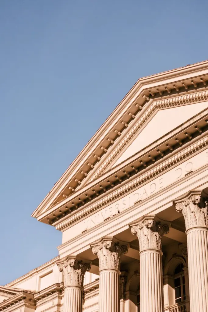 Close-up of Universidade do Paraná's neoclassical architectural facade in Curitiba, Brazil.