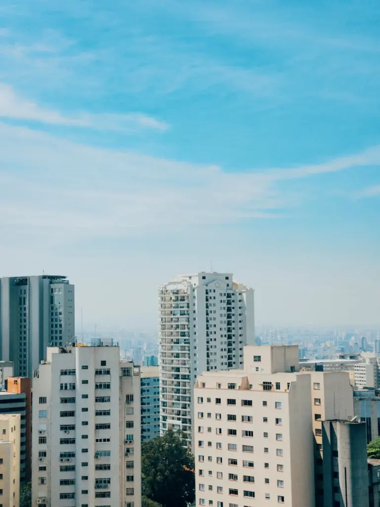 Stunning view of São Paulo's urban skyline featuring modern high-rise buildings under a clear blue sky.