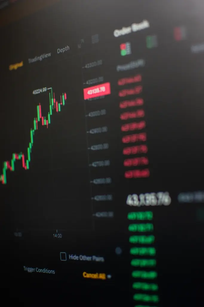 Close-up view of a cryptocurrency trading screen showing market trends and data.
