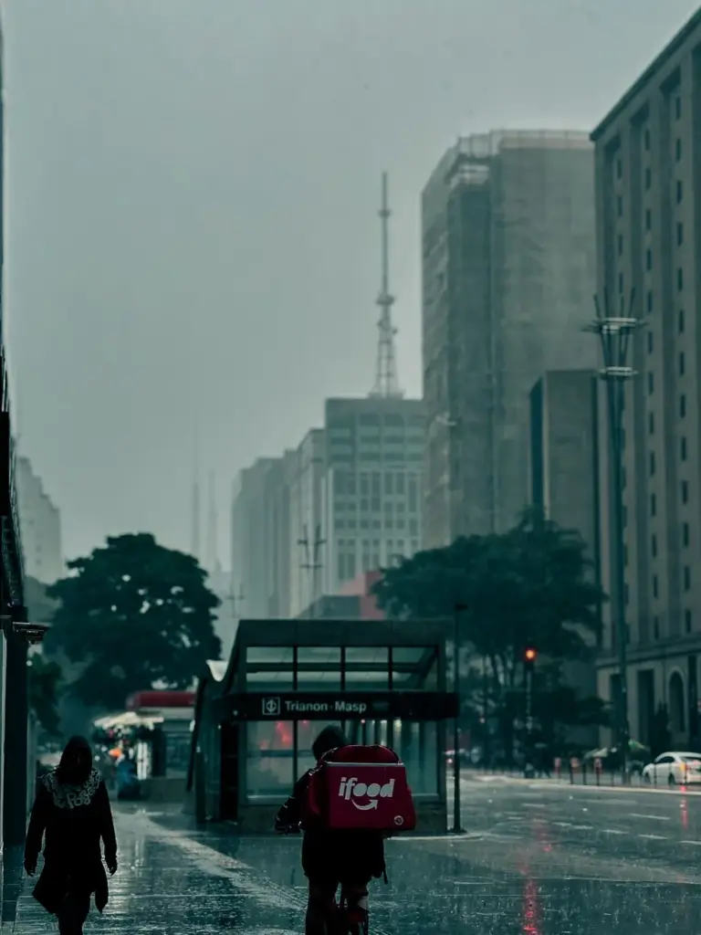 Rainy day in downtown Sao Paulo, capturing skyscrapers and daily city life.