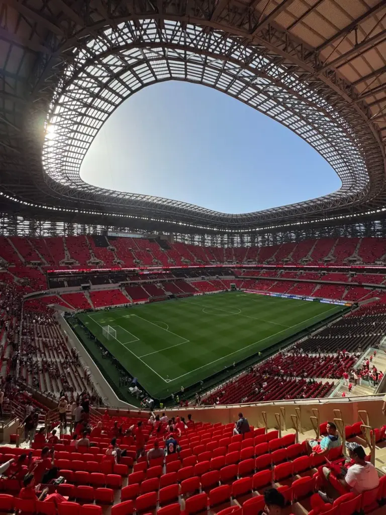 Stunning aerial shot of a vibrant stadium filled with fans in Morocco.
